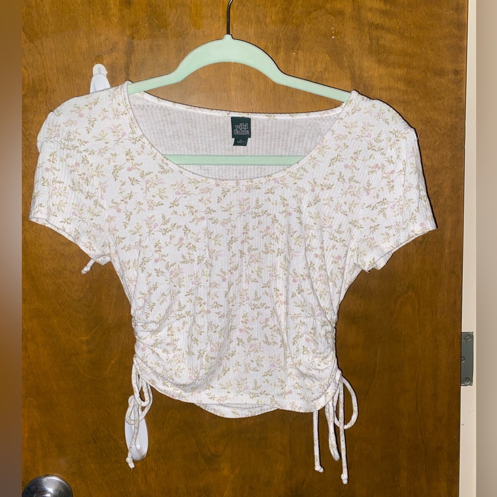 Shirt sleeved cropped shirt size medium with flowers on it